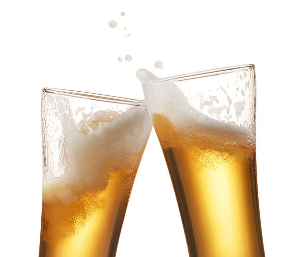 beer toasting two glasses of beer toasting creating splash beer glass splash stock pictures, royalty-free photos & images