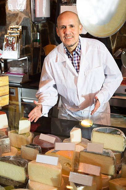 istock salesman selling cheese and jamon 610987902