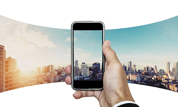 Businessman hand taking panoramic photo of Bangkok cityscape in sunrise Businessman hand taking panoramic photo of Bangkok cityscape in sunrise 360 degree view photos stock pictures, royalty-free photos & images