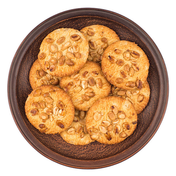istock Peanut cookies in a brown plate. 610990754
