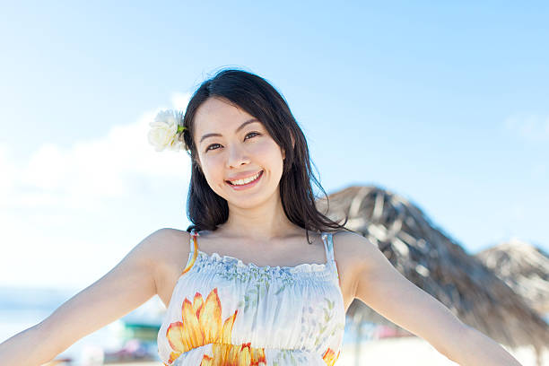 istock Japanese woman  on the beach 611062144