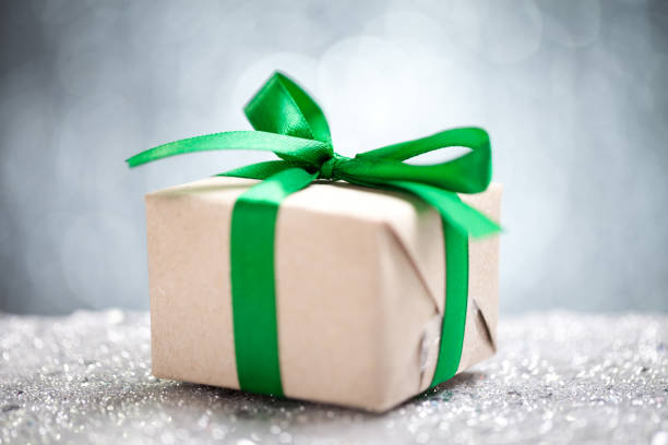 istock Close up of gift box with silver background 611062424