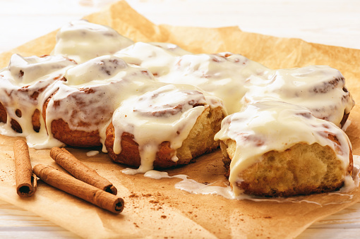 Cinnamon buns glazed with cream cheese.