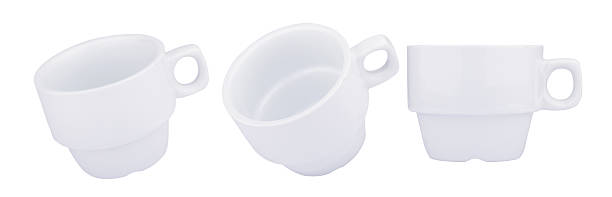 istock Empty white coffee porcelain cups isolated on white 611063484