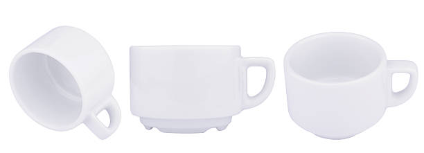 istock Empty white coffee porcelain cups isolated on white 611063620