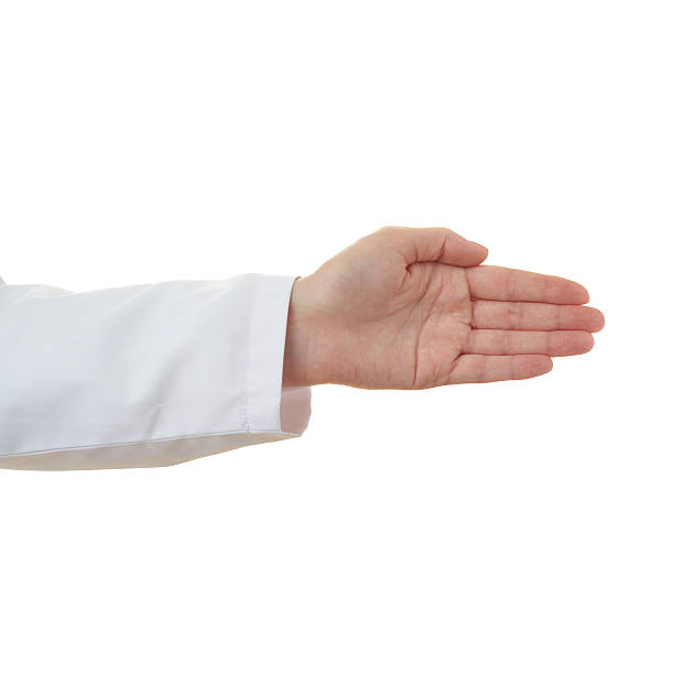 istock Doctor female hand over white isolated background 611065290