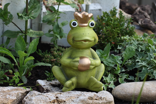 Decorative frog in the garden