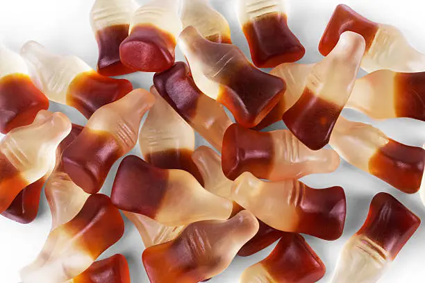 Photo of Cola flavored gummy jellies ,background image.