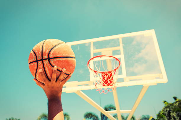istock Basketball hoop on a blue sky,color filter 611067976