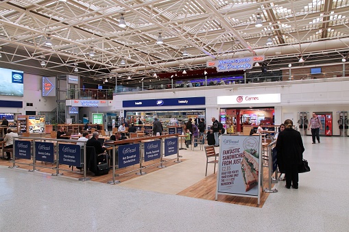Birmingham, UK - April 24, 2013: Travelers wait at Birmingham International Airport, UK. With 8.9 million travelers served it was the 7th busiest UK airport in 2012.