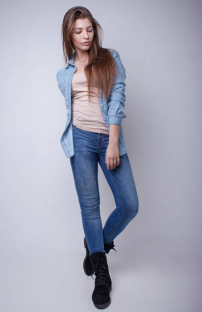 istock young beautiful woman studio portrait 611070628
