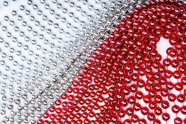 istock Christmas garland made from small red and silver beads, close-up 611072078
