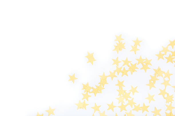 istock star shaped yellow confetti on white background 611072174