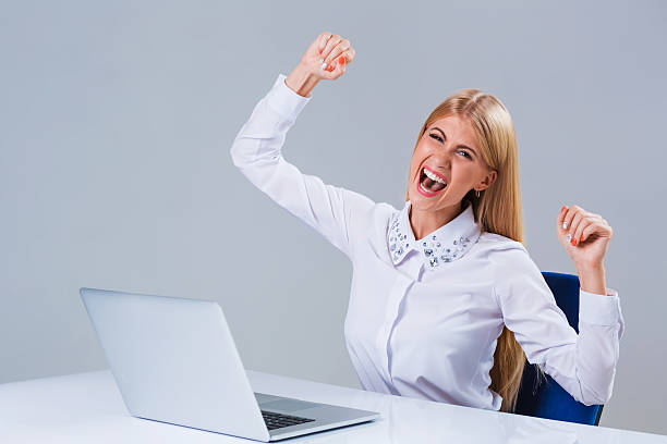 istock Young businesswoman working at laptop computer. 611073734