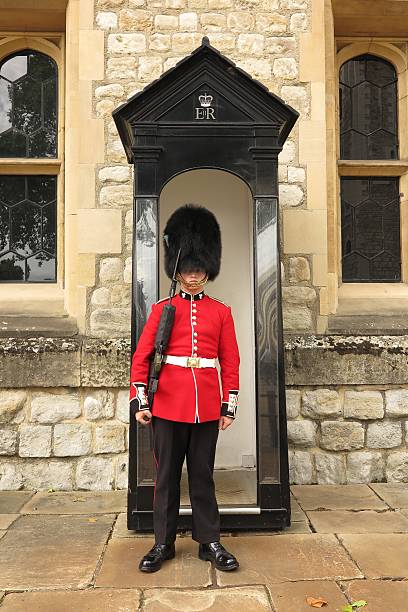 Young royal protecting Crown Jewels at Tower of London stock photo