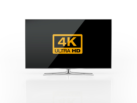 UHD 4K Smart Tv standing on white background. Front view. There is 4K Logo on the display. Clipping path is included.