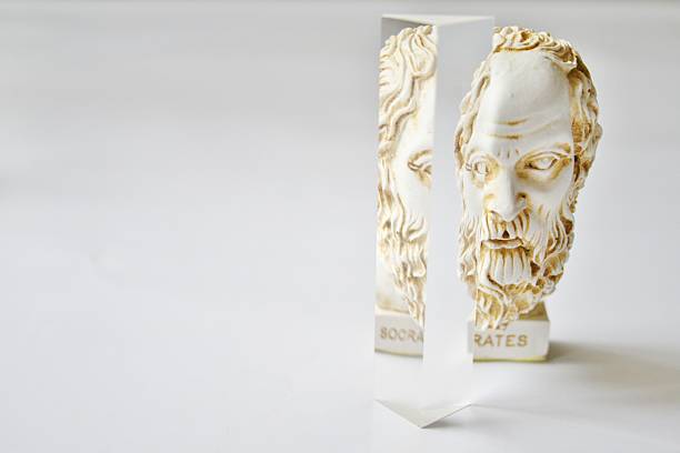 blurry defocused image of red buddha statue wearing asian golden jewelry for background