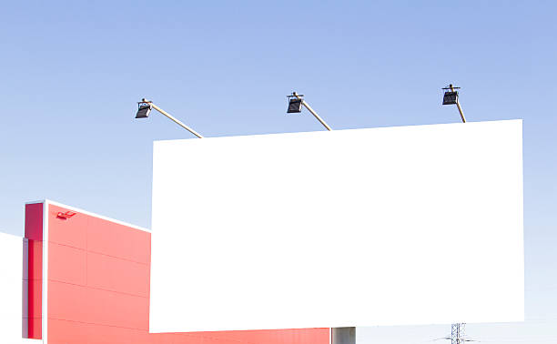 istock Blank billboard in the city against blue sky 611080080