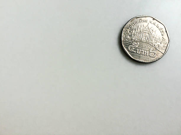 istock Thai Five baht coin on marble table with copy space 611082084