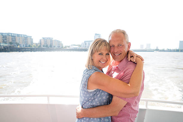 istock Romantic couple riding a boat in London 611082426
