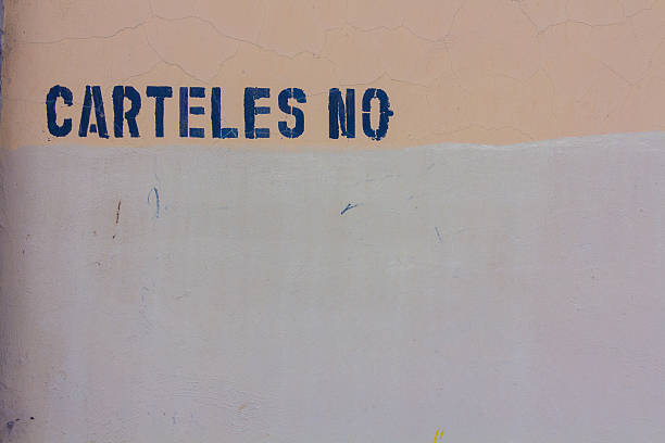 istock Wall background with writing CARTELES NO 611083444