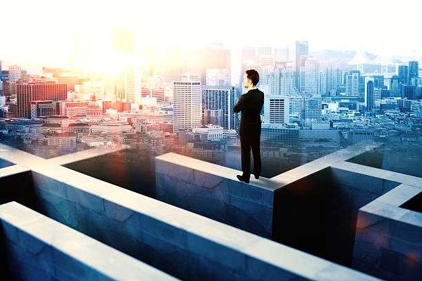 istock Businessman on maze wall 611083796
