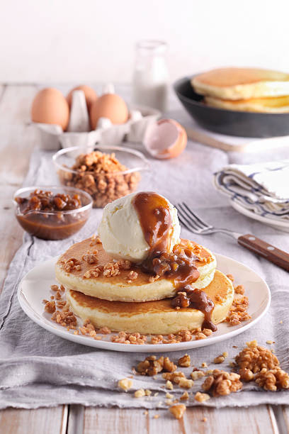 Pancake walnut crunch with cream on the table