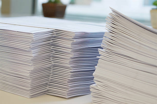 istock Printout on table near window at office 611086540