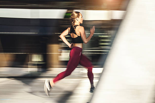 istock Female Athlete Running Outdoors 611087812