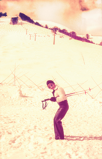 Vintage image of a woman skiing