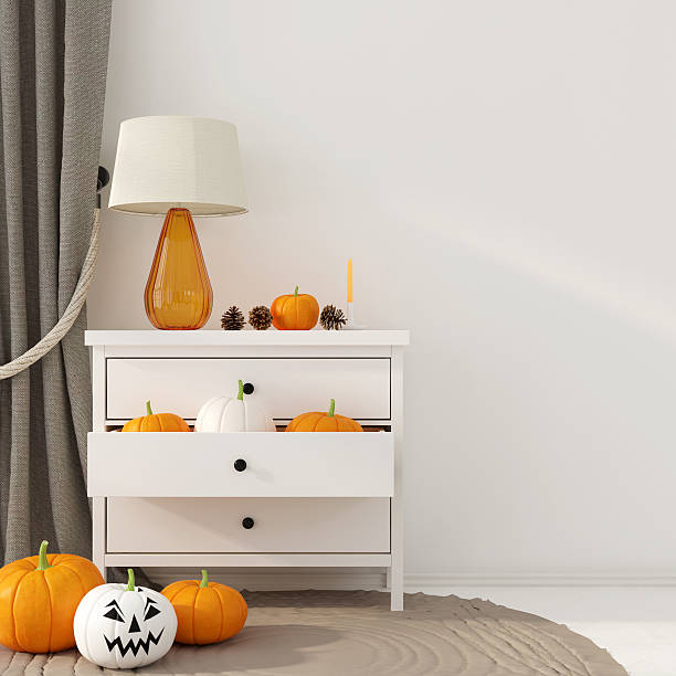 istock Interior decoration for Halloween with white dresser 611091450