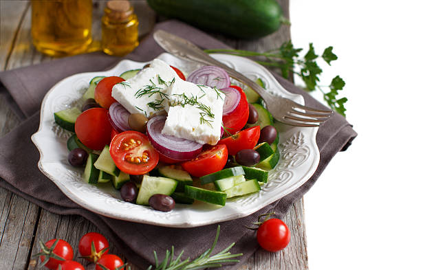 istock Greek salad on wood 611091540