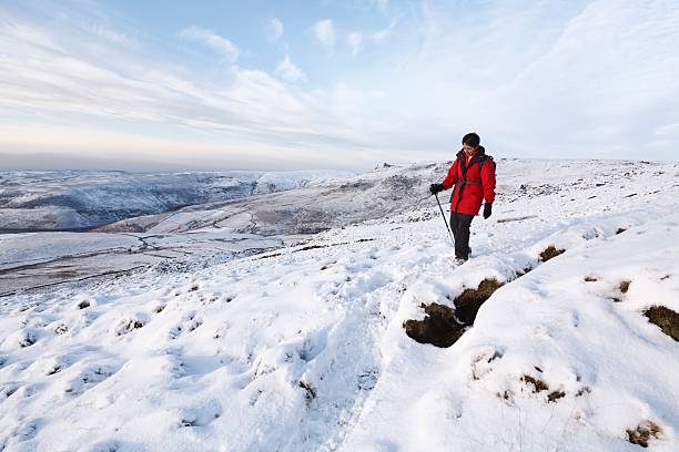 istock Indian woman hiking in winter 611092622