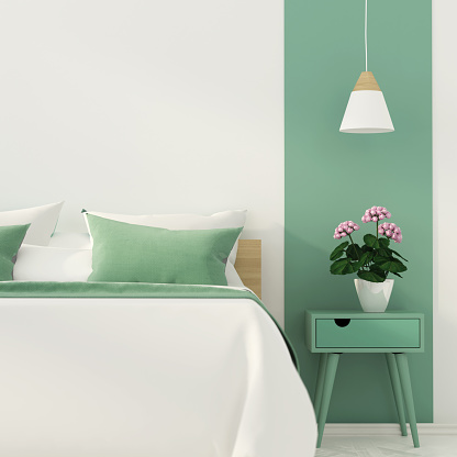 Elegante dormitorio con decoración verde photo
