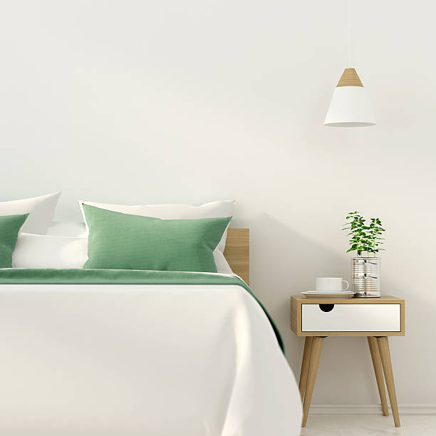 istock Stylish bedroom with green decoration 611093588
