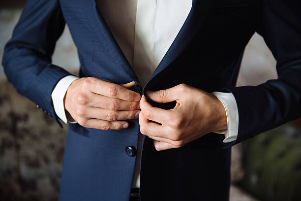 istock man wears a jacket. concept of business 611095232