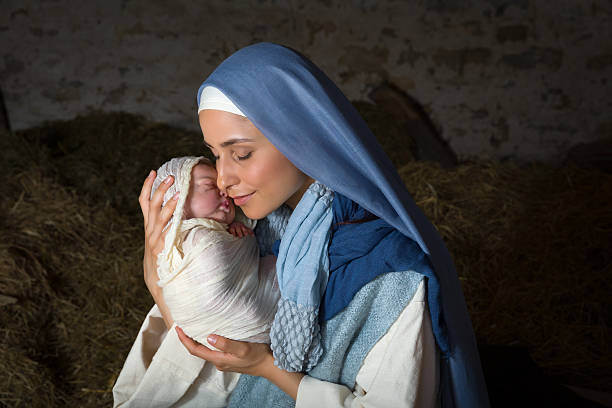 Christmas live nativity scene Live Christmas nativity scene in an old barn - Reenactment play with authentic costumes.  The baby is a (property released) doll. west bank photos stock pictures, royalty-free photos & images