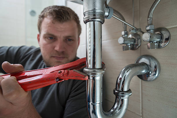 Plumber at work Plumber at work hobbyist stock pictures, royalty-free photos & images