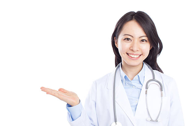 istock Japanese female doctor making gestures 611101802