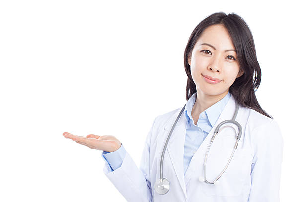 istock Japanese female doctor making gestures 611101866