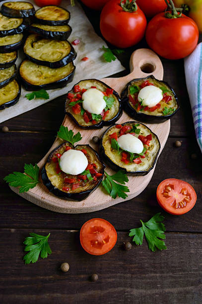 istock Spicy fried eggplant slices with red pepper, garlic 611103728