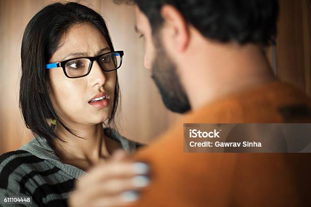 Happy Asian Young Man And Woman Talking Face To Face Stock Photo - Download Image Now