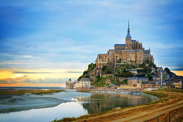 Photo of Mont St Michel at sunset , France