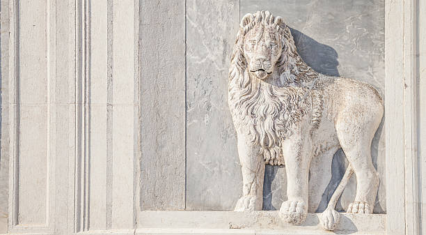 istock Marble lion on church facade 611106782