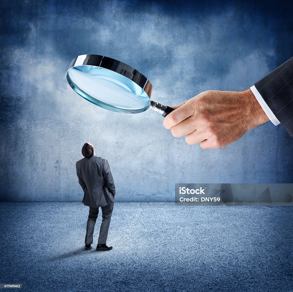 Businessman Looks Up At Businessman Holding Large Magnifying Glass Stock  Photo - Download Image Now - iStock