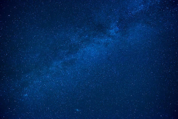 istock Blue dark night sky with many stars 611170748