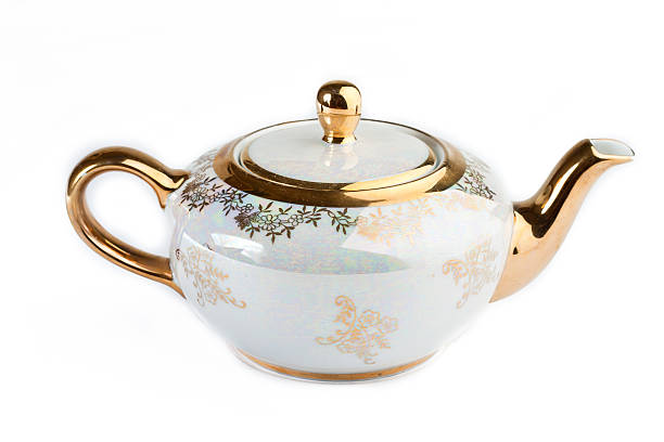istock Cup and teapot from porcelain for tea 611171624