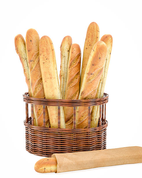 istock Baguettes In A Basket Isolated On White Background 611172008