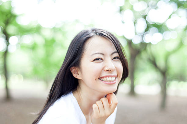Japanese  woman in a park