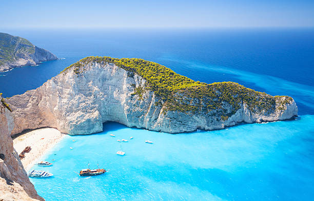 Zakynthos, Greek island, Navagio bay Navagio bay and Ship Wreck beach in summer. The most famous natural landmark of Zakynthos, Greek island in the Ionian Sea mediterranean culture stock pictures, royalty-free photos & images